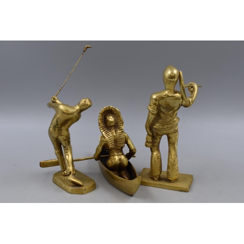 288 - Three Brass Figures including Miner, Golfer and Red Indian in Canoe