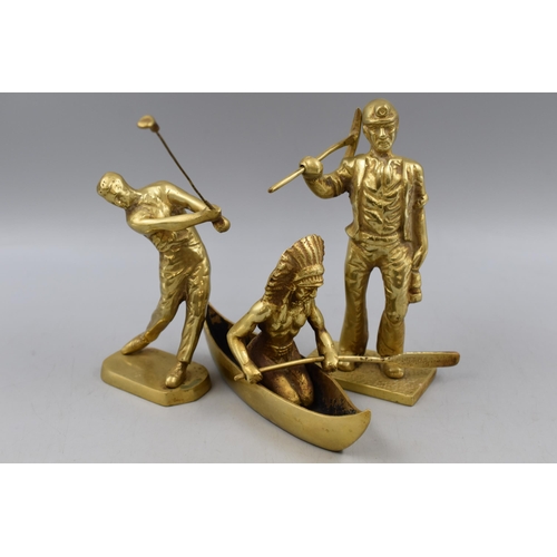 288 - Three Brass Figures including Miner, Golfer and Red Indian in Canoe