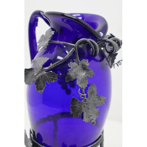 297 - Large Hand Blown Bristol Blue Glass Pitcher with Hand made metalwork stand and Hand Made Metal Art L... 