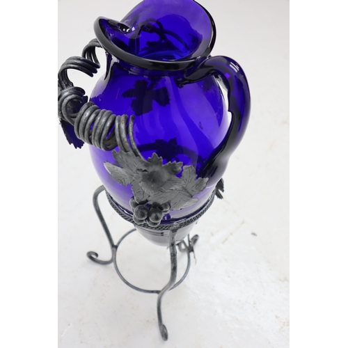 297 - Large Hand Blown Bristol Blue Glass Pitcher with Hand made metalwork stand and Hand Made Metal Art L... 