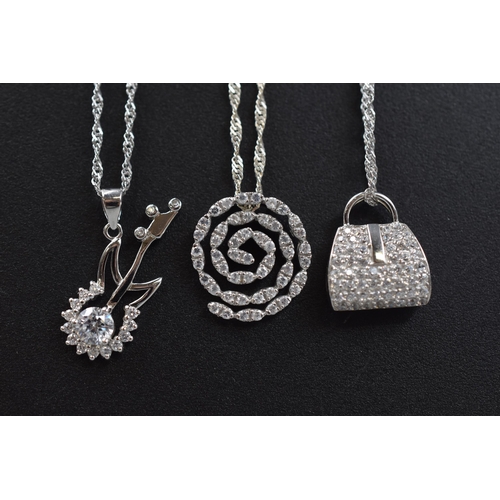 4 - Three New Silver 925 Clear Stoned Pendants on Silver Twisted Chains. Includes Guitar, Handbag and Sp... 