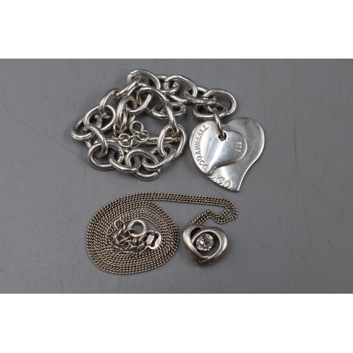 10 - Silver 925 Heart Shaped Pendant Necklace and a Silver Bracelet Complete with Presentation box