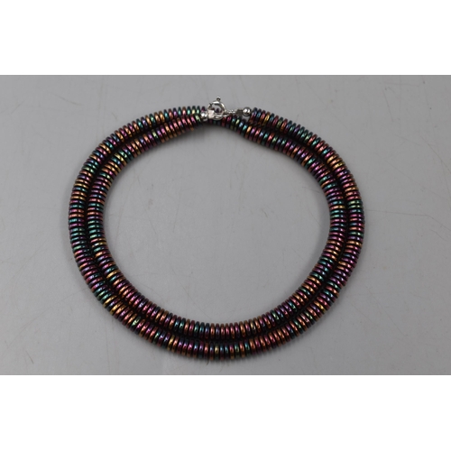 26 - Necklace with Coloured Metal Discs and Silver 925 Clasp