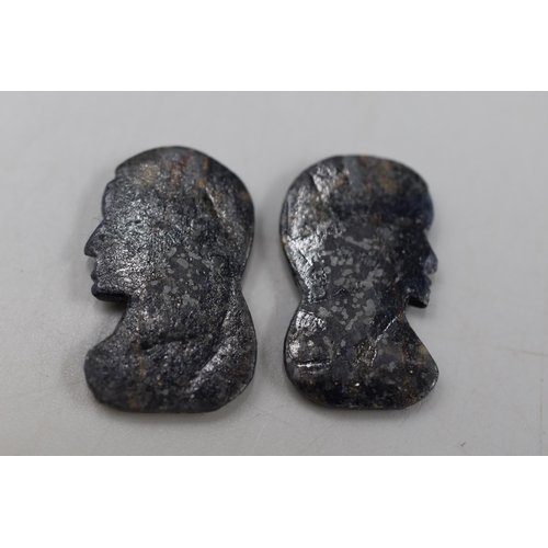 32 - Two Natural Corundum Sapphire Hand caved Stone heads complete with Anchor Certificate