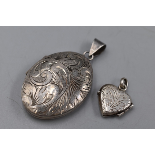 33 - Two Hallmarked Silver Locket Pendants.