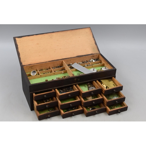 399 - Miniature 12 Drawer Wooden Storage Cabinet Containing a Selection of Watch Parts