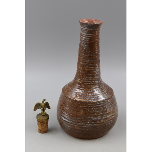 112 - A Stoneware French Wine Carafe, With Eagle Cork. Approx 10.5