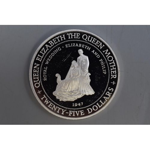 134 - A Jamaican Silver 25 Dollar 'Royal Wedding Anniversary' Coin.