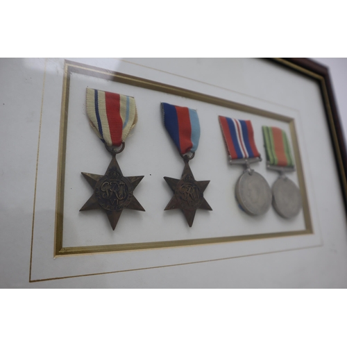 157 - Framed and Glazed Selection of Medals to include the Africa Star, 1939-1945 Star, WWII Defence Medal... 