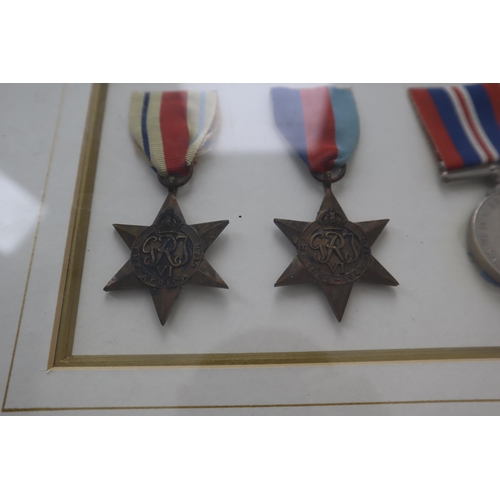 157 - Framed and Glazed Selection of Medals to include the Africa Star, 1939-1945 Star, WWII Defence Medal... 