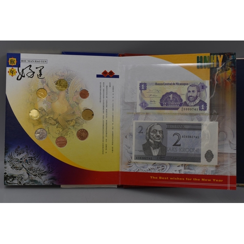 190 - A 2004 Chinese New Year (Year of The Monkey), Coin and Note Set (Rwanda, Zimbawe and Hong Kong) With... 