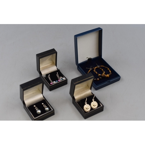 19 - Four Sets of Boxed Silver Earrings