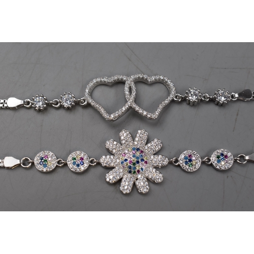 20 - Two New Silver 925 Bracelets to include Diamante Flower Design and Diamante Link Heart Design.