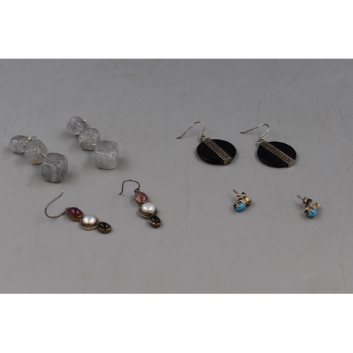 32 - Four pairs of Boxed Silver Earrings