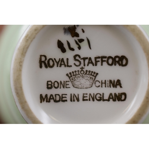 264 - A Fifteen Piece Royal Stafford Tea Set, In Green, White and Gold.