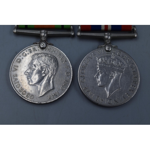 122 - George VI WWII Defence and Service Medals complete with Ribons