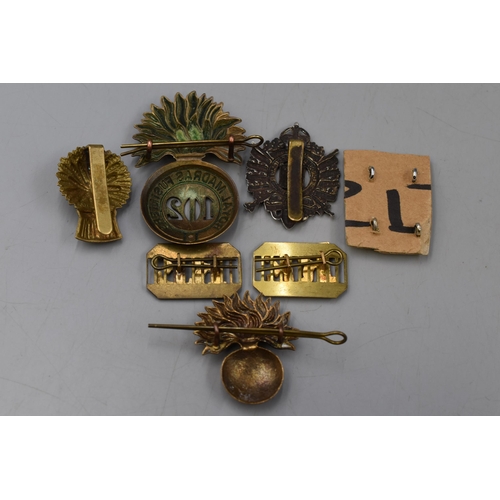 128 - Seven Military Badges, Includes Royal Engineer, Royal Madras, London Rifle Brigade and More.