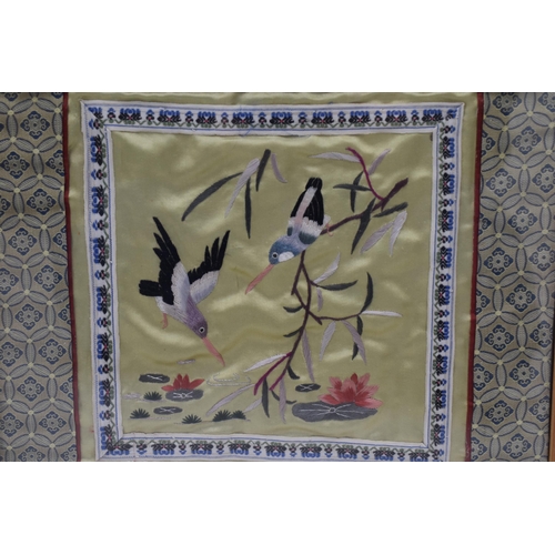 304 - Two Oriental Embroidered Silks in Matching Framed and Glazed Mounts (30cm x 30cm)