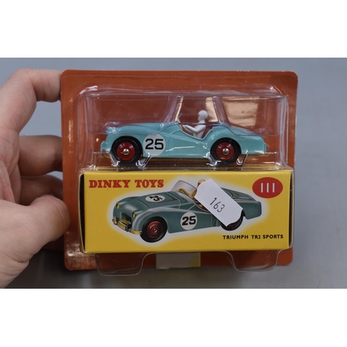 317 - Three Boxed Dinky Die Cast Vehicles. Includes Austin Covered Wagon, Triumph TR2 Sports and other.