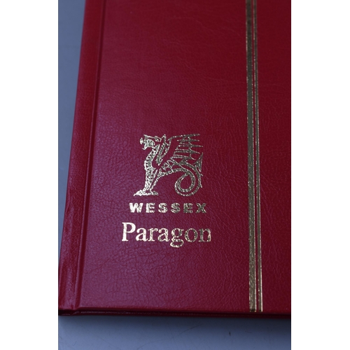 341 - Four Paragon Wessex Stamp Albums Containing a Selection of Worldwide Stamps.