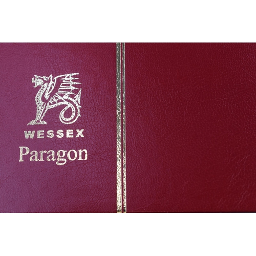 341 - Four Paragon Wessex Stamp Albums Containing a Selection of Worldwide Stamps.