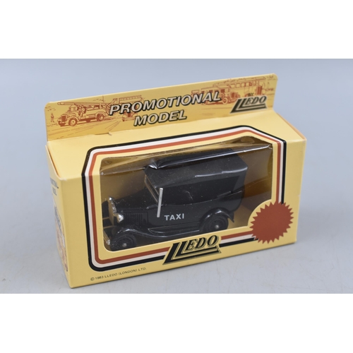 376 - A Selection of Seven Lledo Die Cast Cars, Includes Taxi, Express Star and More.