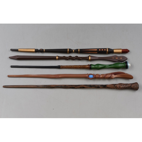 377 - Five Replica Harry Potter Wands.