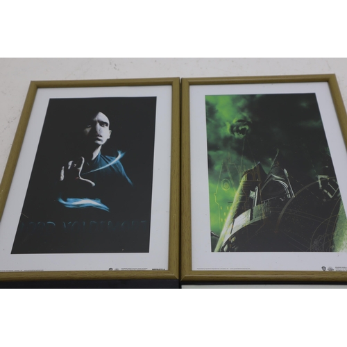 591 - A Selection of Eight Harry Potter and Magic Themed Framed and Glazed Pictures.