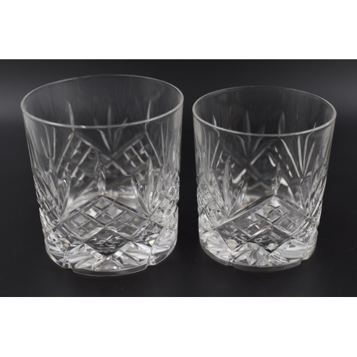 595 - A Selection of Cut Crystal Drinking Glasses. Includes Wine Glasses, Whiskey Glasses and more.