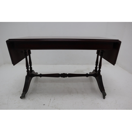 330 - Mid Century Strongbow Drop Leaf Coffee Table sitting on Brass Castor Clawed Feet 32