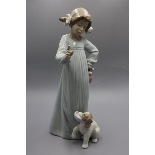 10 - Nao by Lladro Figure of Girl and Naughty Dog. Approx. Height 10 Inch.