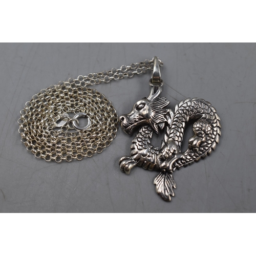 35 - A 925. Silver Dragon Pendant on 925. Silver Chain.