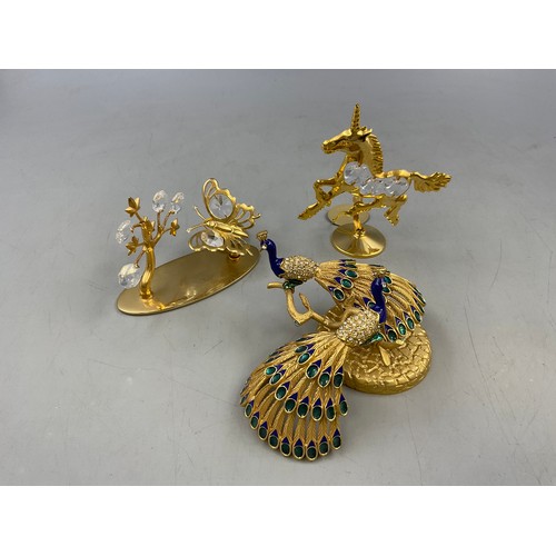 21 - Selection of Decorative Ornaments to include Peacocks, Butterflies and a Unicorn.