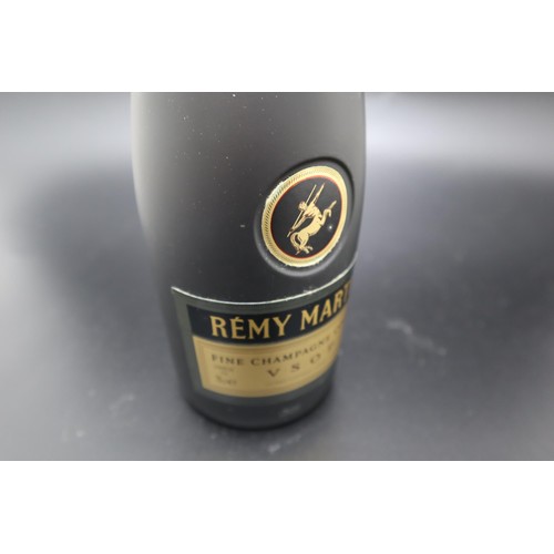 2A - A Bottle of Remy Martin Champagne Cognac, Unopened In Original Tin.