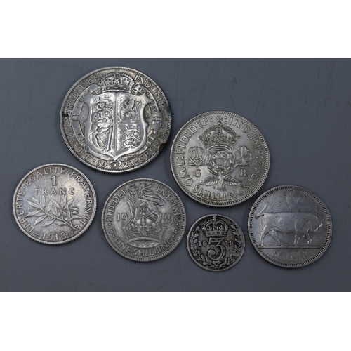 192 - Six Silver Coins including George V Half Crown, George VI 1942 Shilling, French 1918 One Franc and m... 