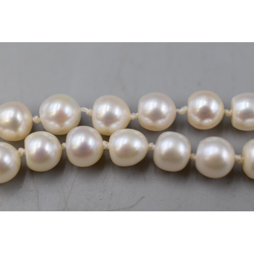 73 - Long Pearl Necklace with Gold 375 Clasp.