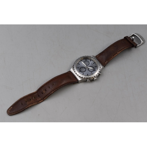 87 - A Gents Swatch Wrist Watch With Leather Strap, Working When Tested.