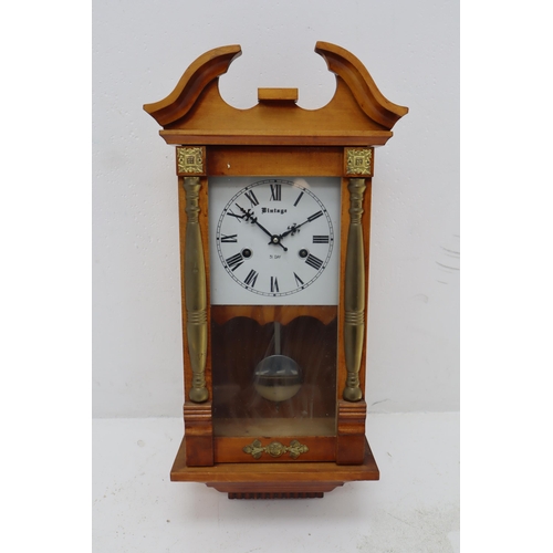 373 - A Vintage 31 Day Wall Clock With Key and Brass Embellishments. Approx 24