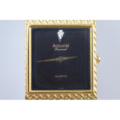 105 - A Ladies Accurist Diamond Watch, In Case With Instructions. Working.