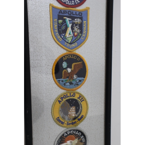 379 - A Framed and Glazed Selection of Twelve Apollo Patches.