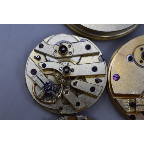 128 - A Selection of Eight Pocket Watch Movements For Spares and Repairs.