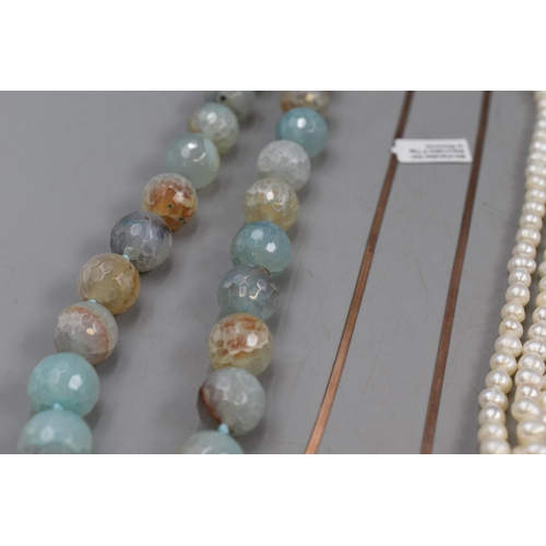 146 - Selection of Five Necklaces (Four are 925 Silver) to include Two Natural Stoned, One Pearl Necklace ... 