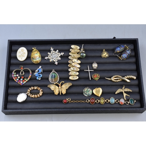 148 - Mixed Tray of Costume Jewellery to include Pendants, Brooches and Bracelets