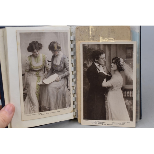 236 - A Photo Album Containing A Selection of Vintage Postcards.