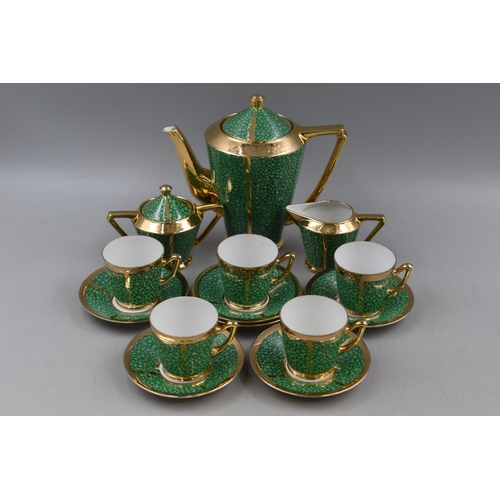 279 - Fourteen Piece Suvesco Green and Gold Tea Set.