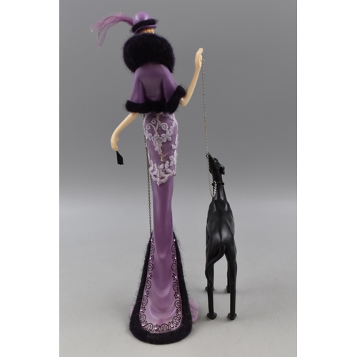 306 - At Deco style Figure of Lady with Dog (33cm)