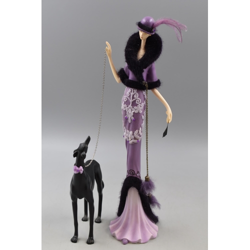 306 - At Deco style Figure of Lady with Dog (33cm)