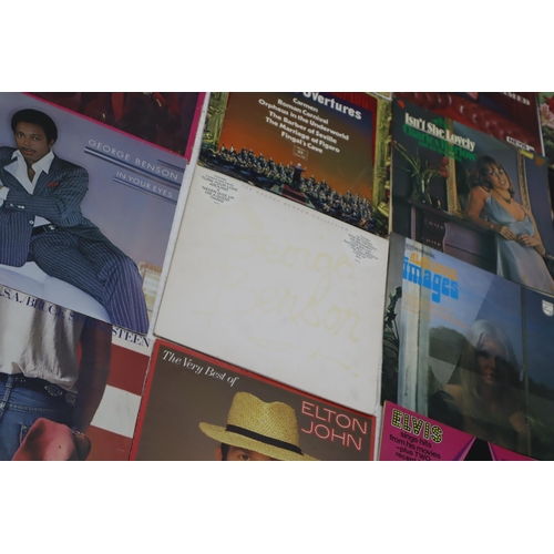 587 - A Selection of Vinyl LP's To Include Bruce Springsteen, A Star is Born, Elvis and More. Includes Som... 