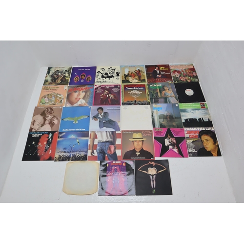 587 - A Selection of Vinyl LP's To Include Bruce Springsteen, A Star is Born, Elvis and More. Includes Som... 