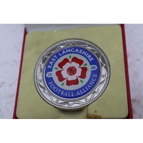 600 - A Mixed Lot to Include A Boomerang, Alarm Clock, East Lancashire Football Alliance Coin and More.